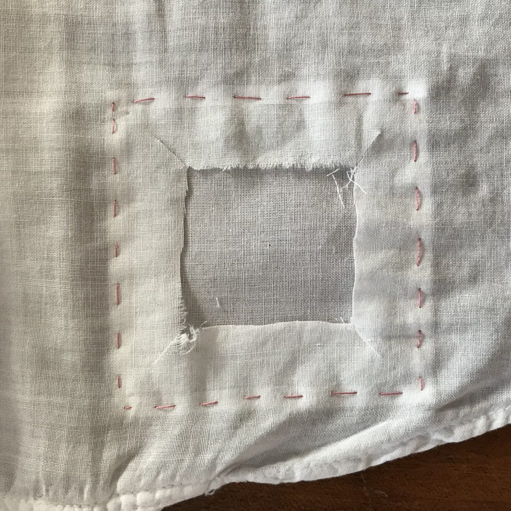 Patch step 3: It has to get worse before it gets better: snip away the offending rip leaving a gaping hole in gorgeous, irreplaceable vintage fabric whist crying. (c) 2018 Cathy Hay