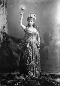 Mrs. Cornelius Vanderbilt aka Alice Claypoole Gwynne as 'Electric Light'. Gown created by Charles Frederick Worth. Vanderbilt Ball, March 26, 1883